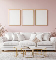 Pink living room with white sofa and gold frames