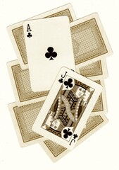 A montage of playing card backs with a pontoon hand revealed.