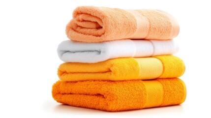 Stack of folded towels in vibrant colors isolated on white background. Generative AI