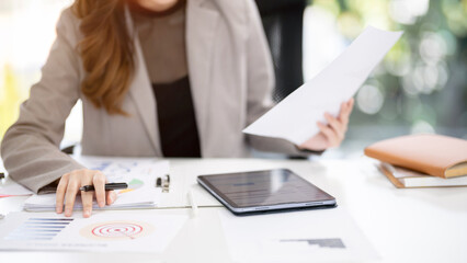 Businesswoman sitting working in office