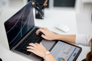 Businesswoman sitting working in office