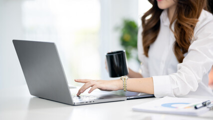 Businesswoman sitting working in office