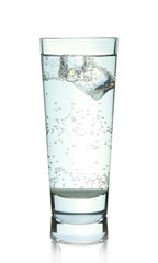 Refreshing soda water with ice cubes in glass on mirror surface against white background