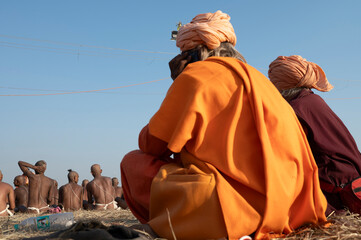 27January 2025 Under the supervision of senior Naga Sadhu Saint the newly inducted Naga Sadhus have gathered on the banks of river Ganga for rituals at the Kumbh Mela in Prayagraj Uttar Pradesh India