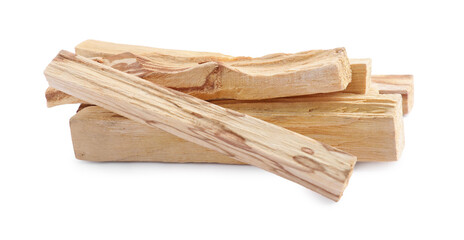 Pile of palo santo sticks on white background