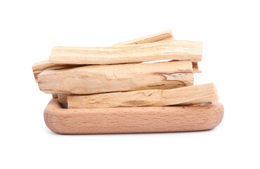 Pile of palo santo sticks on white background
