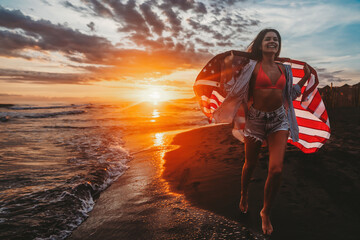 Young woman holding national American flag walking ocean beach. America Independence Day concept