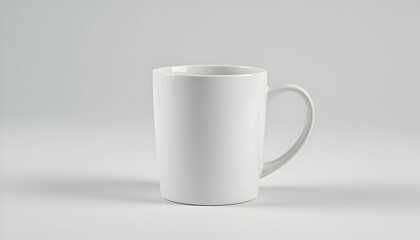 Obraz premium Simple White Ceramic Mug on Neutral Background for Product Presentation
