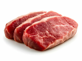Fototapeta premium Fresh cuts of raw beef steak displayed on a white background, perfect for culinary recipes, cooking guides, and food promotions.