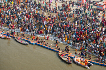 Prayagraj,India-28 pJanuary 2025 Top angle view of the crowd gathered at Sangam and bathing on the...