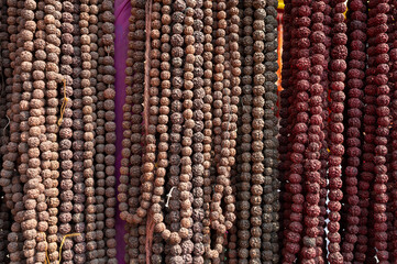 Prayagraj,India-28 pJanuary 2025 Rudraksha beads are kept hanging for sale at the Kumbh Mela in...