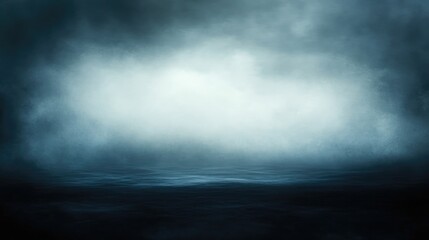 A tranquil scene of the ocean meeting with the overcast sky