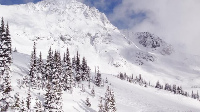 Blackcomb mountain peak, ski resort, snowy mountain peak, Whistler Blackcomb. 4K 24FPS