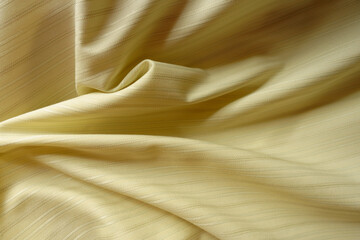 Pastel olive green striped cotton and polyester fabric in soft folds