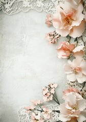 Pastel flowers and lace on textured backdrop