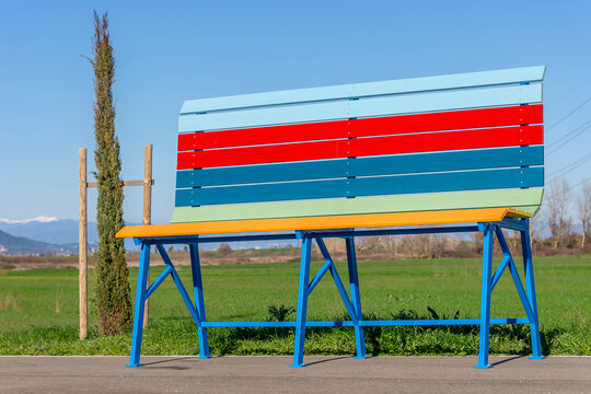 A colorful giant bench on the border between Cenaia and Lavoria, Pisa, Italy