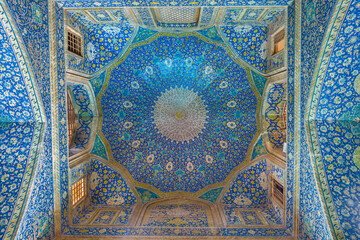 Ceiling patterns in one of the buildings of the Shah Mosque complex (Imam Mosque), Isfahan, Iran. Building was built in 1611-1641. Ceiling and walls are decorated with colorful Persian patterns