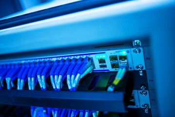 Cable Connection in Data Center with Blue Lighting Effects