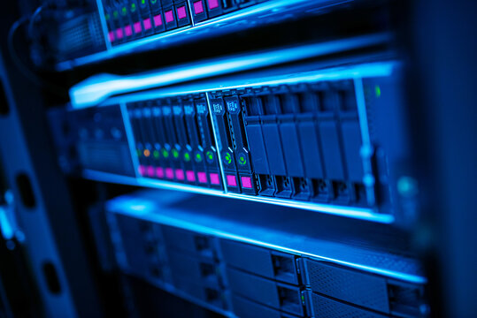 Close-up of Modern Data Server Rack with LED Indicators and Cables