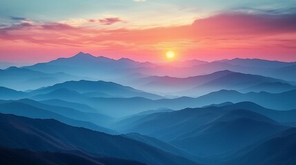 Obraz premium Serene sunset over layered mountains with vibrant colors and soft clouds in the sky