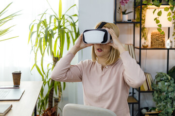 Engaging in virtual reality experience at home office