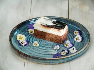 Delight in a selection of traditional Romanian sweets featuring eclairs, tarts, and amandines,...