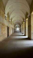 Medieval monastery corridor with columns in the church. Cistercian Abbey Lubiaz