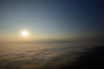 Sea of ​​clouds and sunrise from the outer rim of the volcano, Aso City, Kumamoto Prefecture,...