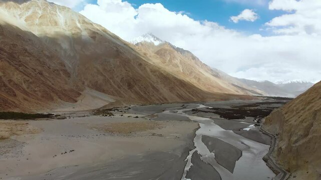 Mesmerizing journey along a road that winds through the rugged terrains of Diskit in Ladakh, India