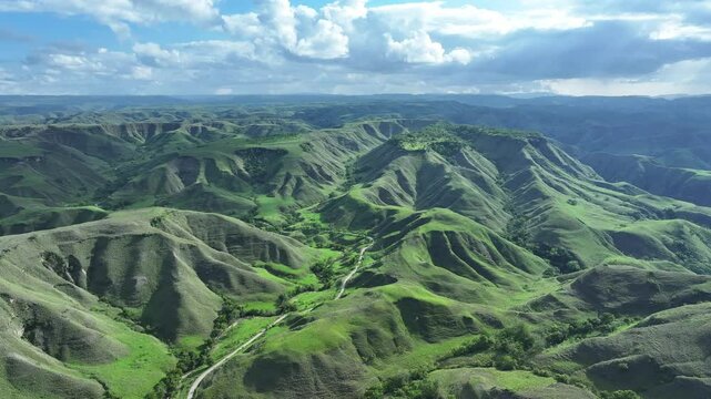 Aerial view of green hill Bukit Tanau, Sumba, Indonesia. Nature landscape background.