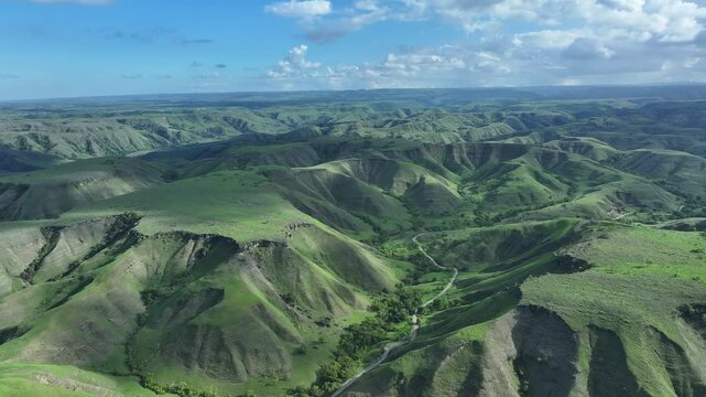 Aerial view of green hill Bukit Tanau, Sumba, Indonesia. Nature landscape background.