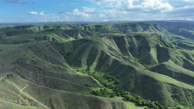 Aerial view of green hill Bukit Tanau, Sumba, Indonesia. Nature landscape background.
