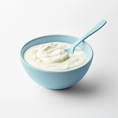 Yogurt in Blue Bowl with Spoon