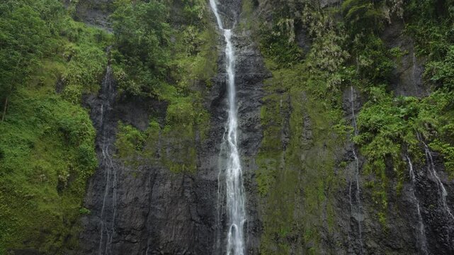 A small waterfall in the jungle of a tropical pacific island in Faarumai, Tahiti, French Polynesia