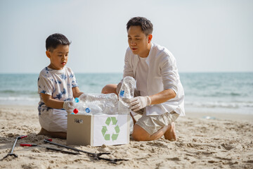 Asian family conservation recycle beach together. Father Protect environmental.