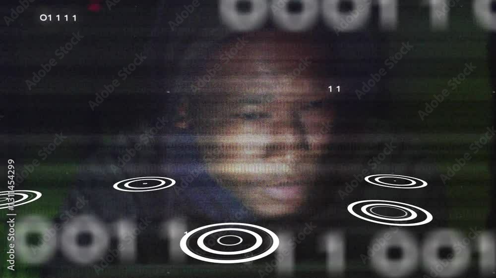 Poster in school, animation overlaying binary code and target symbols on person's face