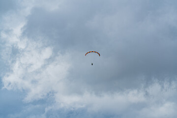 A parachute is flying in the sky