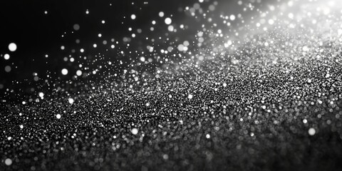 Fototapeta premium Stunning abstract black background featuring delicate snowflakes.