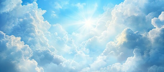 Vibrant blue sky with radiant sunlight breaking through soft white fluffy clouds creating a serene background with ample space for text.