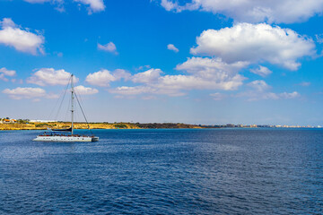yacht and blue water sea