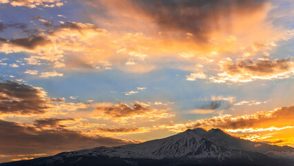 beautiful mountain sunset or sunrise with majestic mountaoin with white snow peak and beautiful...