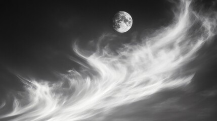 Majestic Moon Among Wispy Cirrus Clouds in Night Sky