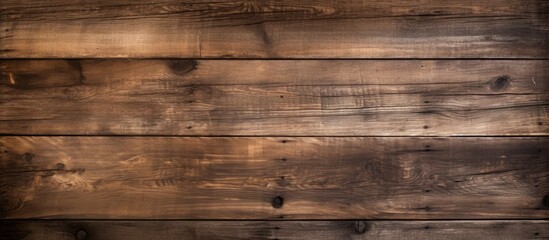 Obraz premium Rustic dark brown wooden planks create a textured grunge background with a timeless aesthetic suitable for copy space and design projects