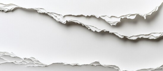 Naklejka premium Minimalist white paper layered abstract design featuring torn edges with varying textures and shades creating depth and contrast across the horizontal layout.