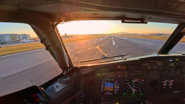 Pilot&rsquo;s cockpit view of an airplane taking off into the sky.