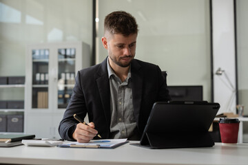 Happy man, entrepreneur, small business owner working online.