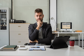 Fototapeta premium successful businessman male with inspiration from their excellent financial results.
