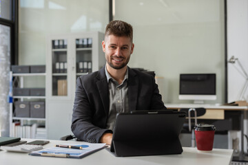Fototapeta premium successful businessman male with inspiration from their excellent financial results.