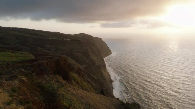Aerial drone epic sunset golden coastline at Ponta do Pargo in Madeira island, Portugal