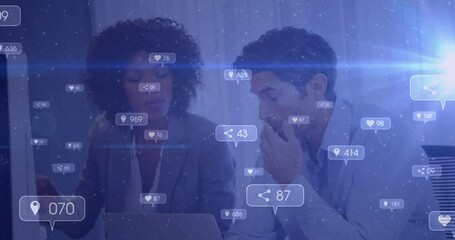 Discussing social media analytics, diverse professionals with digital animation icons overlay